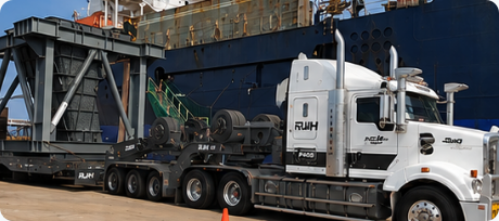 Modern RJ Holley prime mover carrying engineered cargo